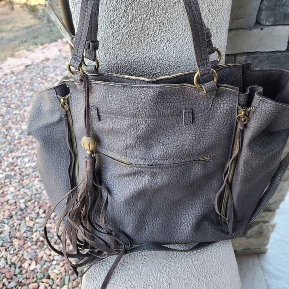 This brown purse is new and never used. It was a gift so there's no tags. - Picture 7 of 7